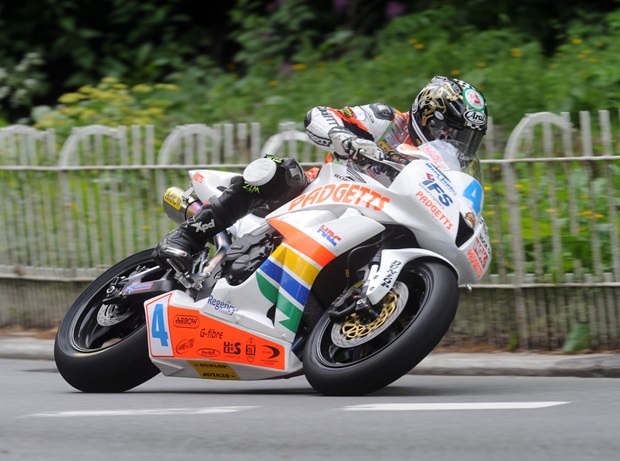 Ian Hutchinson on his way to victory in the opening Monster Energy Supersport TT